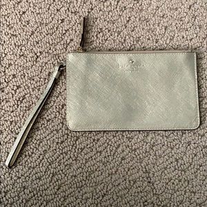 Thin gold Kate Spade wristlet